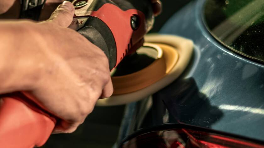 car paint going through paint correction with rotary polisher