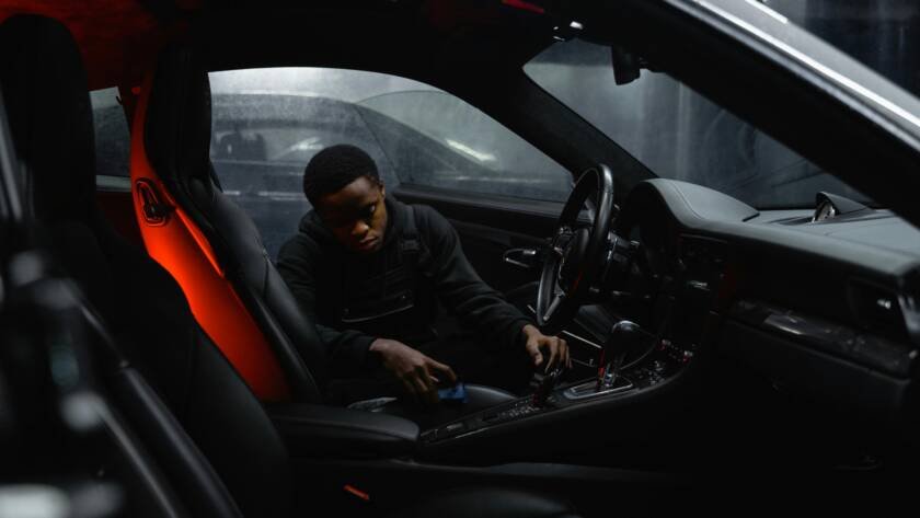 mobile car detailer cleaning luxury car interior